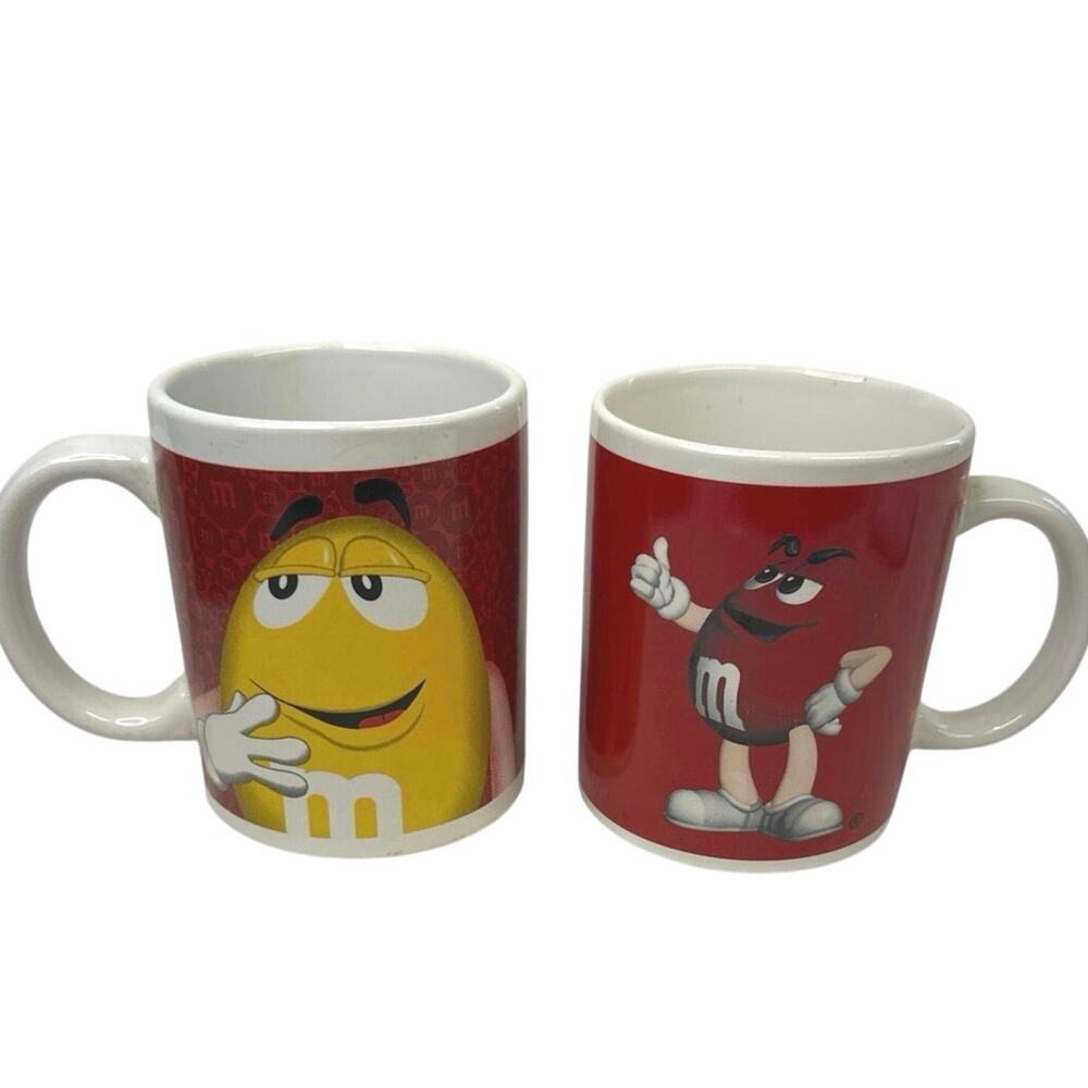 M&M collectable coffee cups, 1 is from 2015 sold together 2 cups.